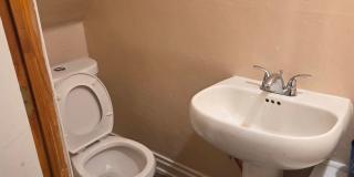 5BR/1.5BA Row Home with Backyard and Laundry Hookups Gallery 4