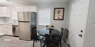RENOVATED 3/2 w/ Den, Granite Counters, Stainless Appliances, Washer/Dryer, & Plank Vinyl Floors! Furnished or Unfurnished, Inc Lawn Maint! Avail NOW for $1775/month! Gallery 4