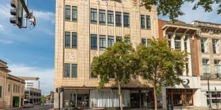 Available Now! Gorgeous 1 Bed, 2 Ba in the Historic Kress Building w/ Private Rooftop Patio! Gallery 1