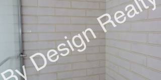 Contemporary 1 Bed 1 Bath with Beautiful Finishes, Private Yard & Off-Street Parking Gallery 16