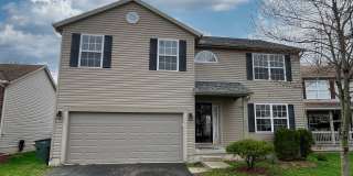 Spacious 4-Bedroom Home with Fenced Backyard, Deck, and 2-Car Garage Gallery 1