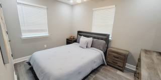 RENOVATED 3/2 w/ Den, Granite Counters, Stainless Appliances, Washer/Dryer, & Plank Vinyl Floors! Furnished or Unfurnished, Inc Lawn Maint! Avail NOW for $1775/month! Gallery 18