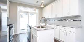 Gorgeous 3-Bedroom Townhome with Finished Basement and Rooftop Deck! Available mid-June! Gallery 7