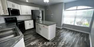 RESERVE AT WEDGEFIELD 3 bedroom 2 bath home with stainless appliances, laminate flooring and a fenced back  yard! Gallery 47