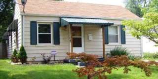 Available now! Great 2 bedroom with AC and detached garage! Gallery 1