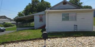 Charming 2-Bedroom Single-Family Home with Patio & Storage Shed Gallery 1
