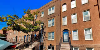 Spacious 709 Sq Ft 1BR with Fireplace & In-Unit W/D at The Car Barn – $2,250 + Electric Gallery 1