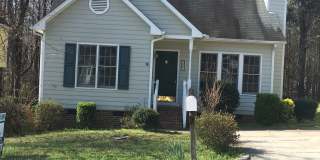 CHARMING 3 BEDROOM WITH DOWNSTAIRS PRIMARY SUITE- 717 St.Catherines~3 brm 2.5 bath~wood burning fireplace~Fenced back yard Gallery 1