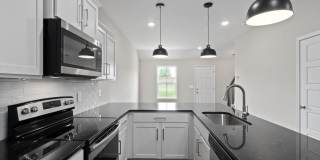 2 Bedroom Townhome Located Close to Post Gallery 7