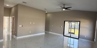 Brand-New Luxury Home with 3-Car Garage & Lawn Care Included | Modern Living in Cape Coral! Gallery 4