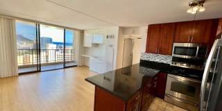 RENOVATED 2 Bedroom, 1 Bathroom, 2 Parking unit with Utilities Included in The Chateau Waikiki with Ocean View! Gallery 1