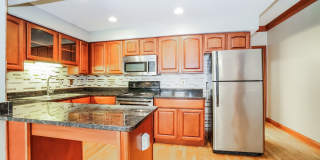 Charming 1-Bedroom Apartment with Exposed Brick, Hardwood Floors & Updated Kitchen Gallery 5