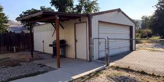 Spacious 2 bed/1 bath home! Fenced yard, a/c, d/w, w/d, large garage and MORE!! Gallery 4