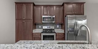 Welcome home to this beautifully maintained townhome in Mossy Oak Village. Gallery 10