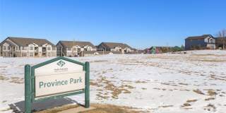 Like new gorgeous ground level Condo with Detached Garage and open floor plan. Gallery 34