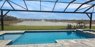 Brand New spacious 4bd/3.5bth Sarasota Home with Swimming Pool, 3-Car Garage and Loft Gallery 1