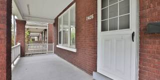 Charming 5-Bedroom Home with Exposed Brick and Modern Upgrades Gallery 4