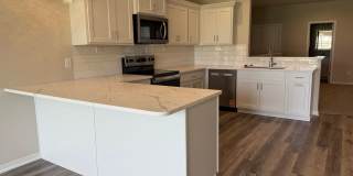 zero entry ranch townhome with 2 stall garage.  Spacious 2 bedroom/2.5 bath Gallery 3