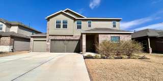 Spacious 4/BR 2.5/BA Two-Level Home with 3-Car Garage  Covered Deck Gallery 1