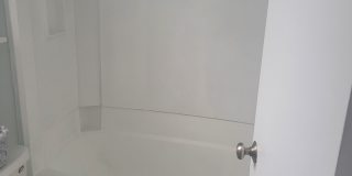 Located in Caneel Cove this 2 bed 2 bath townhome features hardwood floors throughout , Gallery 1