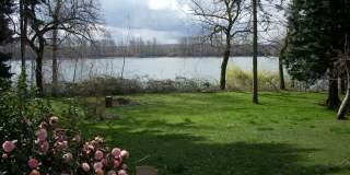 Waterfront Home on 1.5 Acres + 2 Car Garage + Fenced Yard (Vancouver – Evergreen Hwy) Gallery 1
