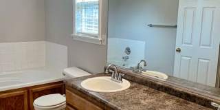 4 Bed, 2 Bath with Fenced Yard, Two-Car Garage, and Jetted Tub Gallery 13