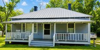 A Charming 3-bedroom, 2-bathroom home in a quiet Country Setting! Gallery 1