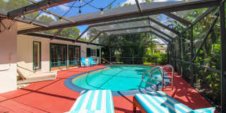 AVAILABLE NOW ** PRIVATE POOL COTTAGE IN BEAUTIFUL COMMUNITY OF HIGHLY-DESIRED COQUINA SANDS ** LARGE OR SMALL DOGS AND CATS ACCEPTED ** 3 PLUS A DEN, 2 BATHROOMS ** SEASONAL ** Gallery 1