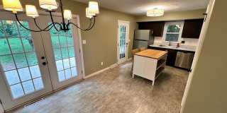 AVAILABLE NOW! Spacious 4 BR, 2 Bath House! Wood Floors, Attached Garage, W/D Included Gallery 16