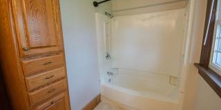 Bright, beautiful home with 3 garage spaces & tons of storage! Gallery 19