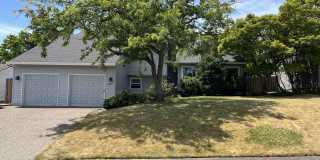 Bright and Open 4 Bedroom Cedar Mill Home with Vaulted Ceilings, Skylights & Multiple Living Areas Gallery 1