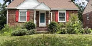 Charming 2-Bedroom Brick Home with Central Air, Garage & Spacious Backyard Gallery 1