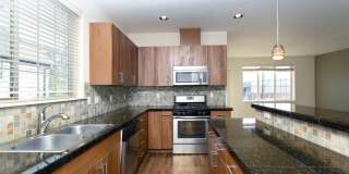 2BD 2.5BA + Bonus Room/Den/Office Townhouse w/Garage + AC + Washer/Dryer Included Gallery 1