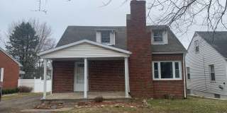 Coming soon, brick cape cod with garage Gallery 1