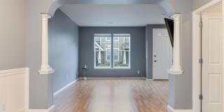 Lovely and bright townhouse with a hard wood flooring throughout, a 2 car garage, AC & more! Lovely and bright townhouse with a hard wood flooring throughout, a 2 car garage, AC & more! Gallery 1