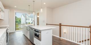 Beautiful 3BR 2.5BA Townhome w/ Full Appliance Kitchen • Garage Parking • Ultra-Modern Gallery 4