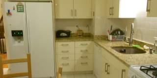 Huge 4 bedroom unit with A/C,  in-unit laundry and parking in Oak Square! Gallery 16