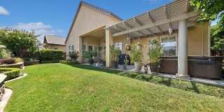 Stunning 3 Bedroom 2.5 Bath Home In Harlan Ranch w/Solar! Gallery 26