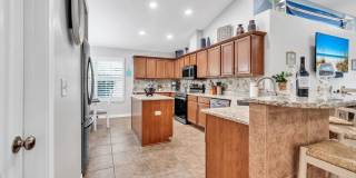 Gorgeous 4 bedroom pool house for rent w/ deeded beach access + pool & yard service included in the rent! Gallery 13