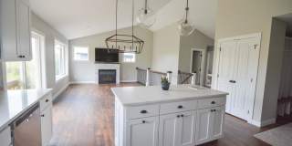 Bright & modern main floor living in newer home! Gallery 7