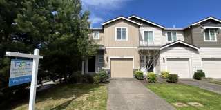 Stylish 3-Bedroom Bethany Residence with Open-Concept Living, Fenced Yard, and Attached Garage Gallery 1