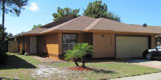 Conveniently Located 4/2 with Fenced Backyard in Winter Springs! Gallery 1