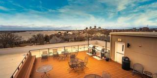 Gorgeous two bedroom two bath with 1574 ft. Two parking spaces included balcony, beautiful rooftop deck no pets. Gallery 19