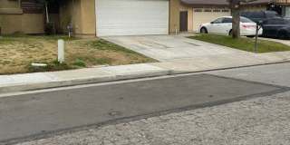 Spacious 3 Bedroom Home with Fireplace, Covered Patio and Community Pool in SW Bakersfield Gallery 1