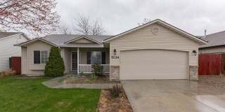 Welcome to this spacious 5-bedroom, 2-bathroom home in Nampa, ID Gallery 1