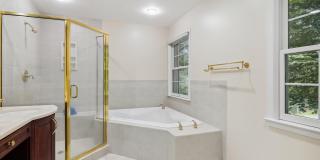 5 BR 4.5 BA home with inground heated pool and extensive hardscape! Gallery 35