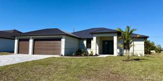 Brand-New Waterfront Luxury in Cape Coral | Heated Pool, Spa, Outdoor Kitchen & 3-Car Garage Gallery 3