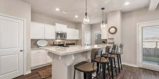 Available August 2026! 4/4.5 Townhomes with Fenced Backyards! Gallery 9