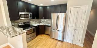 Spacious 3-Bedroom, 2-Bath Apartment with Finished Basement, Private Patio, and In-Unit Laundry Gallery 3
