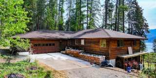 2700 + sq ft family home has it all! Over 2 acres of land and a stunning view of Lake Pend Oreille Gallery 1